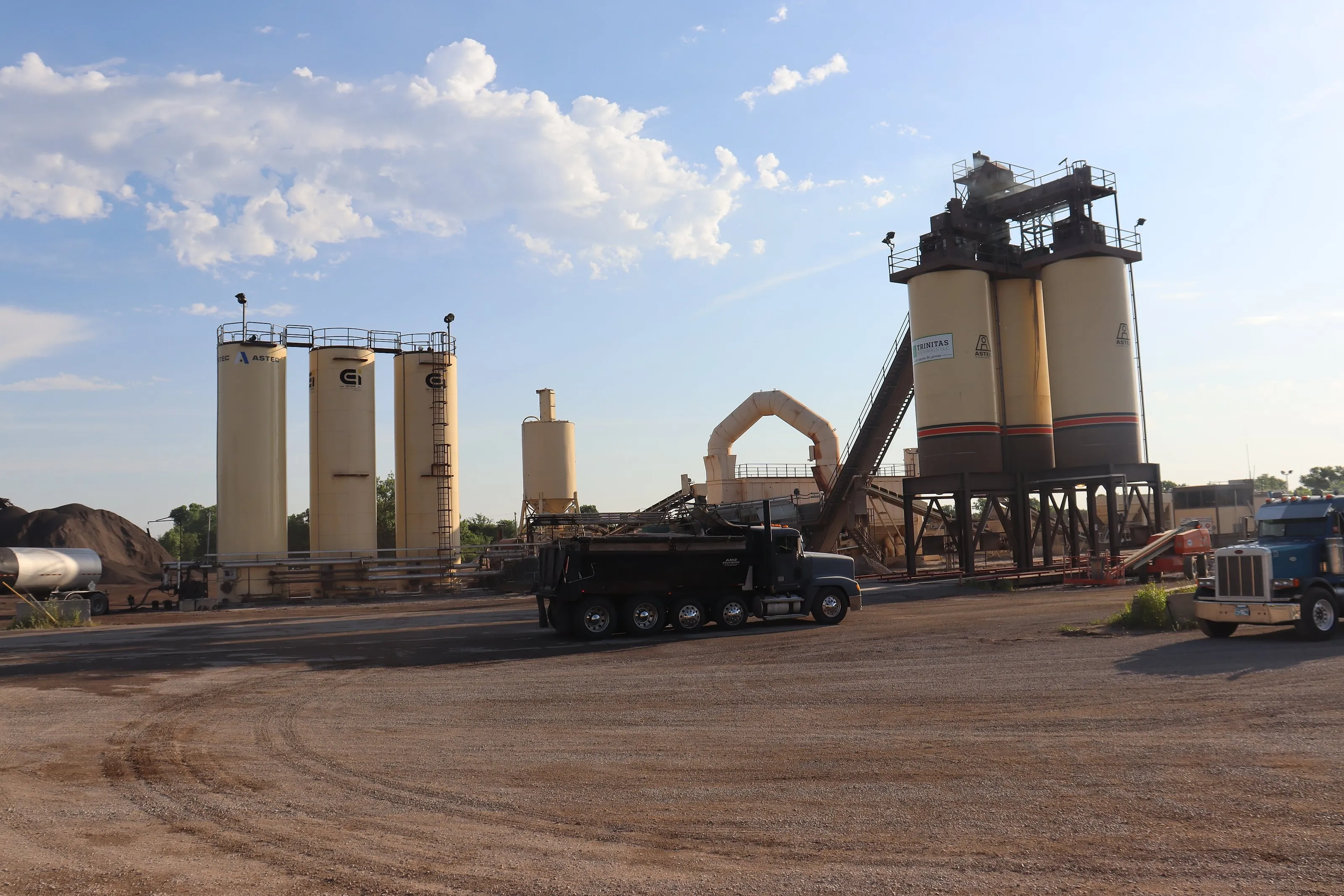 Wide view of the Trinitas Materials asphalt plant at golden hour